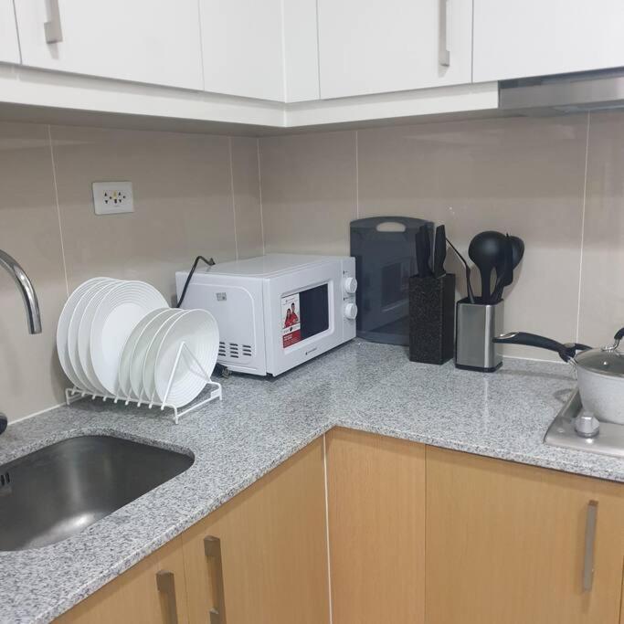 Cozy 1Br Uptown Parksuites Tower1 Bgc マニラ市 エクステリア 写真